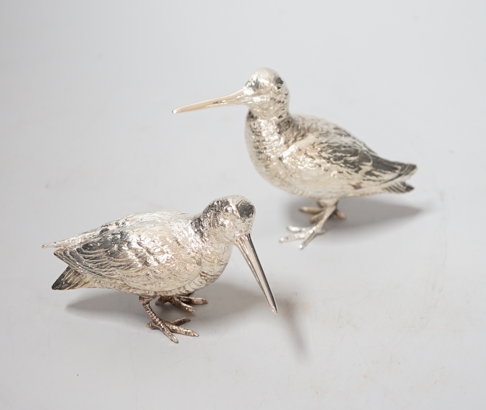 A pair of Elizabeth II silver model free-standing woodcocks, BSE Products, London, 2017, tallest 75mm, 10.5oz.